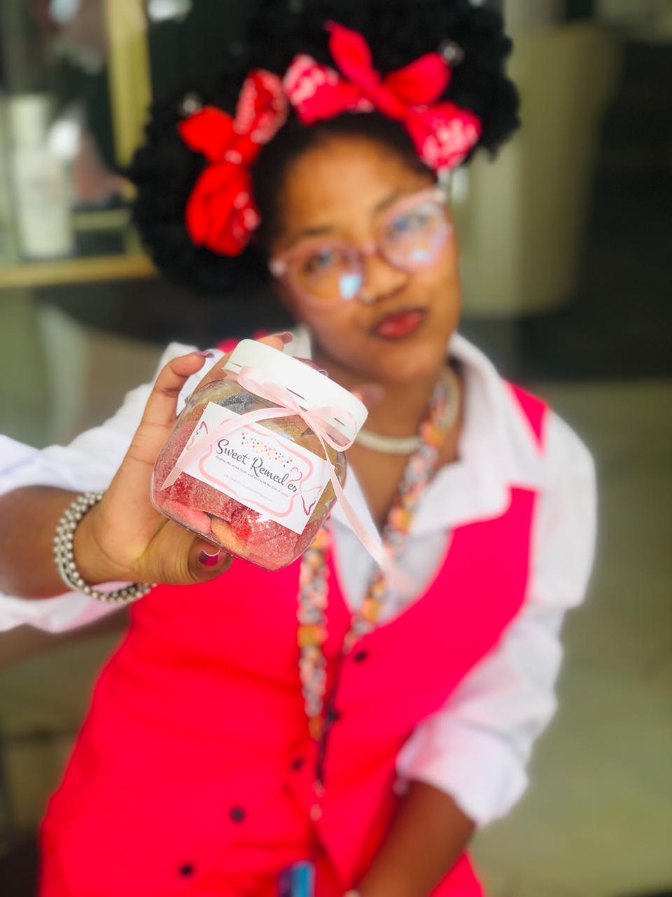 Sweet Remedie Mukundi Mphohoni Posing Packaged Container Sweets